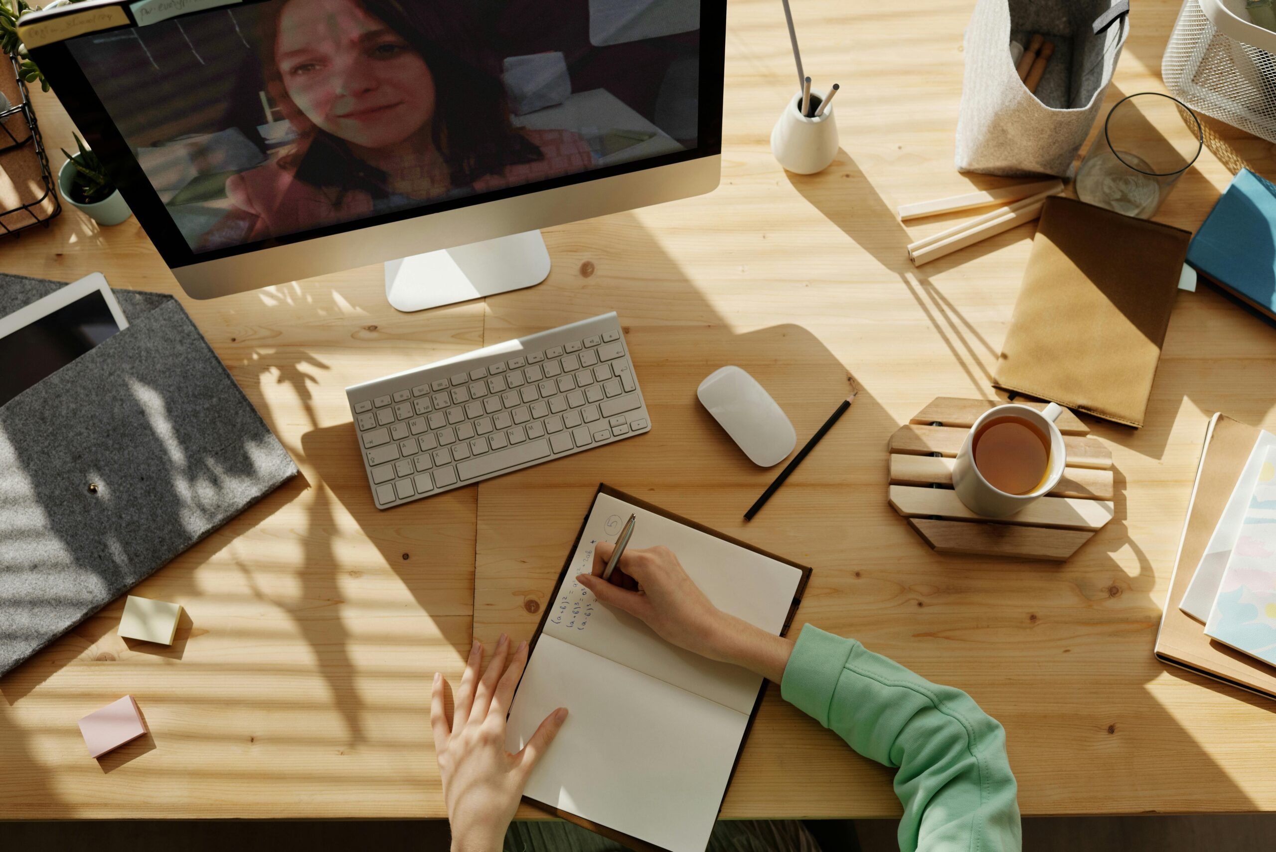 Teacher engaging with students through an online student information system, showcasing seamless communication features like announcement boards and messaging tools